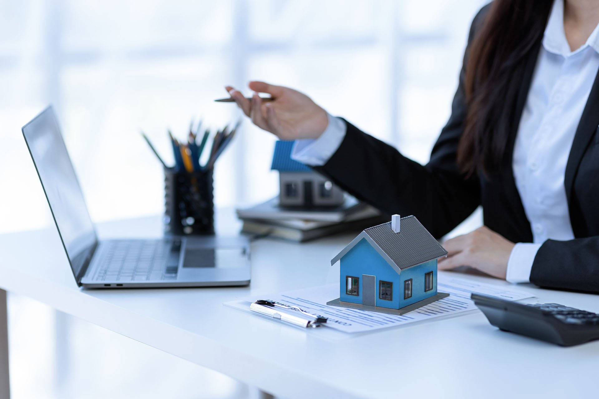 real-estate-broker-agent-presenting-and-consult